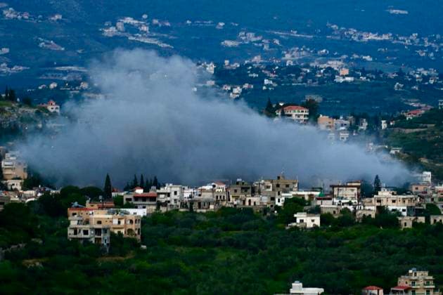 (260518) -- BNAAFOUL, May 18, 2026 -- This photo taken on May 17, 2026 shows smoke rising after an Israeli airstrike targeted a house in Bnaafoul, southern Lebanon. At least five people, including two children, were killed and 15 others wounded on Sunday as Israeli strikes intensified across southern Lebanon, according to Lebanese sources. (Photo by Xinhua) LEBANON-BNAAFOUL-ISRAELI AIRSTRIKE AlixHashisho 