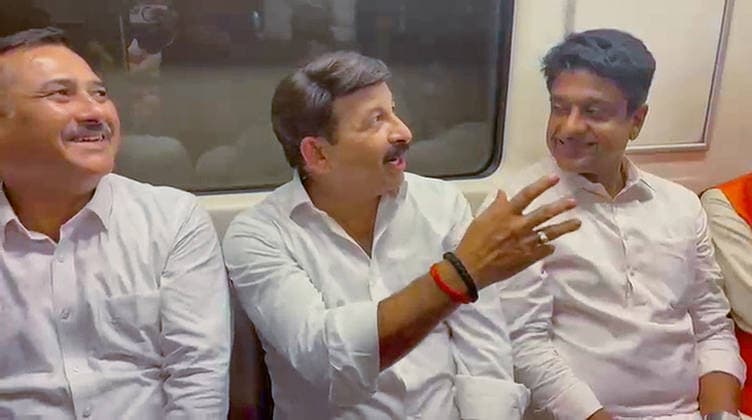 RECORD DATE NOT STATED BJP MP Manoj Tiwari & NDMC Vice Chairman Kuljeet Singh Chahal take metro, backing PM Modi s appeal to conserve fuel New Delhi, May 18 (ANI): BJP MP Manoj Tiwari (centre) and NDMC Vice Chairman Kuljeet Singh Chahal (R) take metro as part of the Mera Bharat, Mera Yogdan and Metro Monday campaigns, supporting Prime Minister Narendra Modi s appeal for fuel conservation, in New Delhi on Monday. (ANI Video Grab) NEW DELHI Delhi India Copyright: xANIx ANI_20260518227