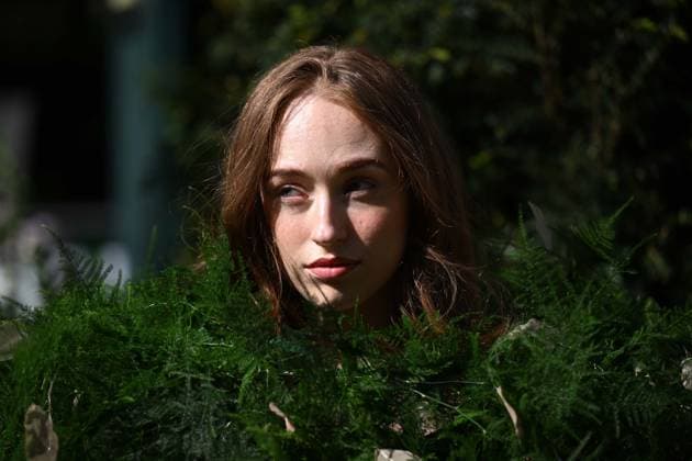 Press day opens for RHS Chelsea Flower Show LONDON, UNITED KINGDOM - MAY 18: A woman poses among plants during the press day of the RHS Chelsea Flower Show in London, United Kingdom, on May 18, 2026, where various garden designs, live performances and promotional events were presented to members of the media. Rasid Necati Aslim Anadolu London United Kingdom. Editorial use only. Please get in touch for any other usage.  Copyright: x2026xAnadoluxRasidxNecatixAslimx
