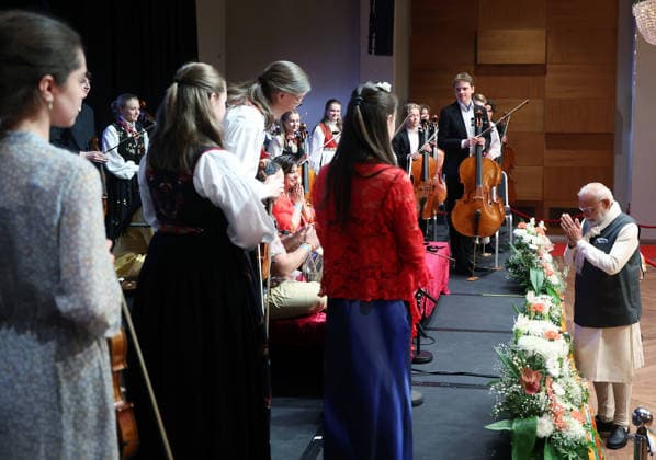 RECORD DATE NOT STATED PM Modi arrives in Norway Oslo Norway , May 18 (ANI): Prime Minister Narendra Modi greets artists as they perform in his welcome, in Oslo on Monday. (DPR PMO ANI Photo) Oslo Norway Copyright: xANIx ANI_20260518274