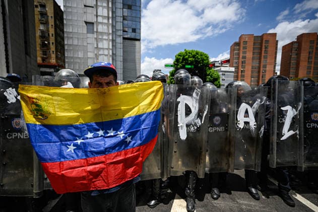 Demonstration in honor of Carmen Navas in Caracas CARACAS, VENEZUELA - MAY 18: Protesters attend a demonstration in honor of Carmen Navas, an 82-year-old mother who died after months of demanding information about her detained son, Victor Quero, who died in state custody in Caracas, Venezuela, May 18, 2026. Maxwell Brienco Anadolu Caracas Venezuela. Editorial use only. Please get in touch for any other usage.  Copyright: x2026xAnadoluxMaxwellxBriencox