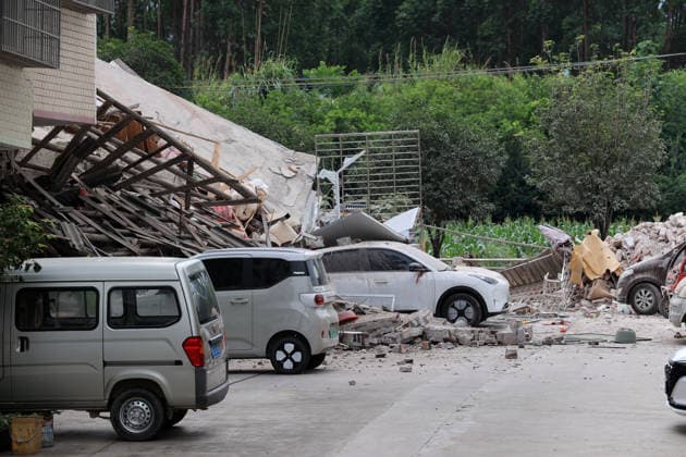 LIUZHOU, CHINA - MAY 18: Cars are crushed under fallen rubble of houses after a 5.2-magnitude earthquake on May 18, 2026 in Liunan District, Liuzhou City, Guangxi Zhuang Autonomous Region of China. A 5.2-magnitude earthquake struck Liuzhou, a city in south China s Guangxi Zhuang Autonomous Region, early Monday, leaving three people missing and four others hospitalized, local authorities said.  Copyright: xVCGx 111642449243