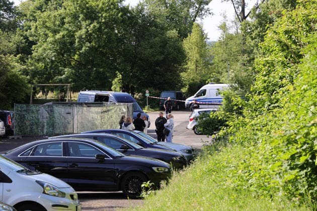 Woman found dead in front of apartment building 23-year-ol