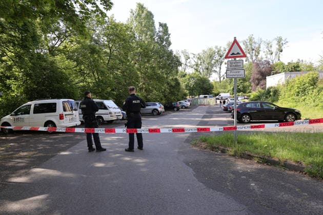Woman found dead in front of apartment building 23-year-ol