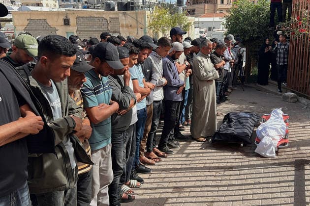 Palestinians Mourn Young Man Killed in Israeli Strike in Khan Younis Palestinians mourn during the funeral of Ahmed Abdel Salam Abu Shab, who was killed in an Israeli strike near the Bani Suheila roundabout in Khan Younis in the southern Gaza Strip, on May 19, 2026. Photo by Tariq Mohammad APA Images Khan Yunis Gaza Strip Palestinian Territory 090526_Khan_Yunis_TM_00(7) Copyright: xapaimagesxTariqxMohammad xapaimagesx