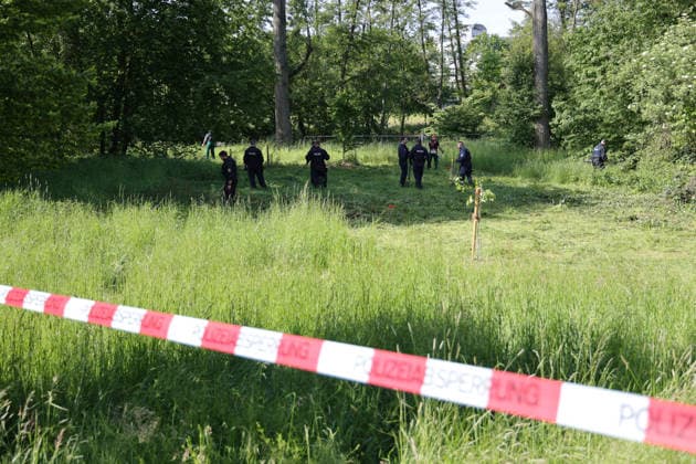 Woman found dead in front of apartment building 23-year-ol