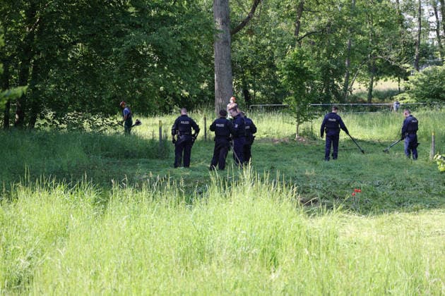 Woman found dead in front of apartment building 23-year-ol