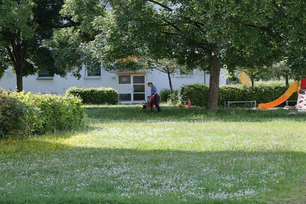 Woman found dead in front of apartment building 23-year-ol