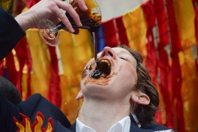 May 19, 2026, London, England, United Kingdom: Climate activists dressed as executives drink Ã¢â‚¬ËœoilÃ¢â‚¬â ¢ (actually treacle) as they stage a protest outside Shell headquarters on the day of the oil giantÃ¢â‚¬â ¢s Annual General Meeting, AGM. London United Kingdom - ZUMAv130 20260519_zip_v130_003 Copyright: xVukxValcicx
