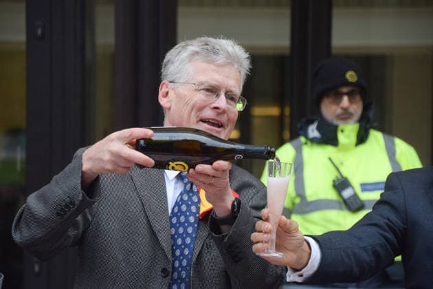 May 19, 2026, London, England, United Kingdom: Climate activists dressed as executives drink champagne as they stage a protest outside Shell headquarters on the day of the oil giantÃ¢â‚¬â ¢s Annual General Meeting, AGM. London United Kingdom - ZUMAv130 20260519_zip_v130_012 Copyright: xVukxValcicx