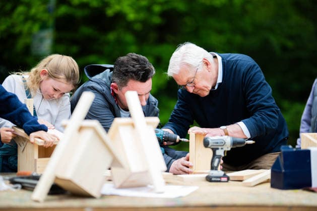 19 05 2026 Frank Walter Steinmeier in Herzebrock Clarholz On the occasion of the Germany-wide day of honor for the birthday of the Basic Law, the Federal President visits numerous participatory activities nationwide here building a birdhouse for the Von Zumbusch Comprehensive School Herzebrock , Herzebrock North Rhine-Westphalia Germany Herzebrock Sports Club