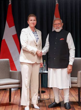 RECORD DATE NOT STATED PM Modi holds a meeting with Denmark PM Mette Frederiksen Oslo Norway , May 19 (ANI): Prime Minister Narendra Modi exchanges a handshake with Denmark Prime Minister Mette Frederiksen during a bilateral meeting ahead of India-Nordic Summit, in Oslo on Tuesday. (Narendra Modi Photo Gallery ANI Photo) Oslo Norway Copyright: xANIx ANI_20260519185