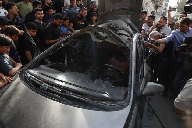 Palestinians Gather at Site of Israeli Strike in Gaza City Palestinians gather at the site of an Israeli airstrike that targeted a vehicle on al-Shuhada Street in Gaza City, on May 19, 2026. According to local sources, the strike killed one person and wounded several others. Photo by Omar Ashtawy apaimages Gaza city Gaza Strip Palestinian Territory 190526_Gaza_OSH_01(2) Copyright: xapaimagesxOmarxAshtawyx xapaimagesx