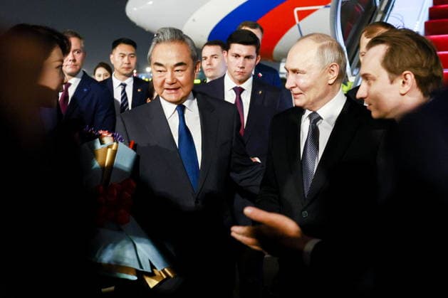 CHINA, BEIJING - MAY 19, 2026: China s Minister of Foreign Affairs Wang Yi (2nd L front) and Russia s President Vladimir Putin (2nd R front) during a ceremony marking Putin s arrival at Beijing Capital International Airport (Shoudu). Russian President Putin s official visit to China coincides with the 25th anniversary of the Treaty of Good-Neighbourliness and Friendly Cooperation Between the People s Republic of China and the Russian Federation, which was signed on 16 July, 2001. Vladimir Smirnov TASS  92744785