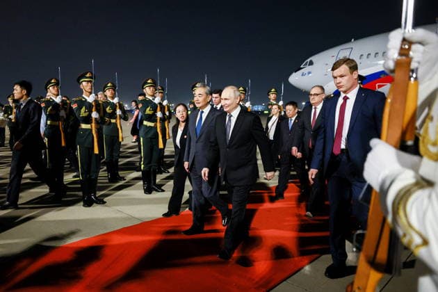 CHINA, BEIJING - MAY 19, 2026: China s Minister of Foreign Affairs Wang Yi and Russia s President Vladimir Putin (L-R centre front) during a ceremony marking Putin s arrival at Beijing Capital International Airport (Shoudu). Russian President Putin s official visit to China coincides with the 25th anniversary of the Treaty of Good-Neighbourliness and Friendly Cooperation Between the People s Republic of China and the Russian Federation, which was signed on 16 July, 2001 Beijing China  - ZUMAt113 20260519_zaa_t113_564 Copyright: xVladimirxSmirnovx