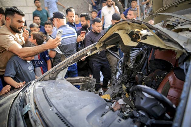 Israeli army targets vehicle in Gaza Strip GAZA CITY, GAZA, PALESTINE - MAY 19: Palestinians inspect a damaged vehicle after an Israeli army strike in the al-Rimal neighborhood of Gaza City, Gaza Strip, Palestine on May 19, 2026. According to reports, one person was killed and four others were injured in the attack targeting the vehicle. Saeed M. M. T. Jaras Anadolu Gaza Palestine. Editorial use only. Please get in touch for any other usage.  Copyright: x2026xAnadoluxSaeedxM.xM.xT.xJarasx