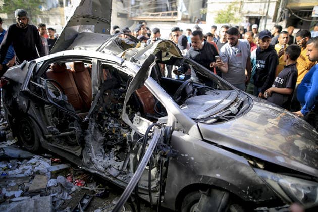 Israeli army targets vehicle in Gaza Strip GAZA CITY, GAZA, PALESTINE - MAY 19: Palestinians inspect a damaged vehicle after an Israeli army strike in the al-Rimal neighborhood of Gaza City, Gaza Strip, Palestine on May 19, 2026. According to reports, one person was killed and four others were injured in the attack targeting the vehicle. Saeed M. M. T. Jaras Anadolu Gaza Palestine. Editorial use only. Please get in touch for any other usage.  Copyright: x2026xAnadoluxSaeedxM.xM.xT.xJarasx