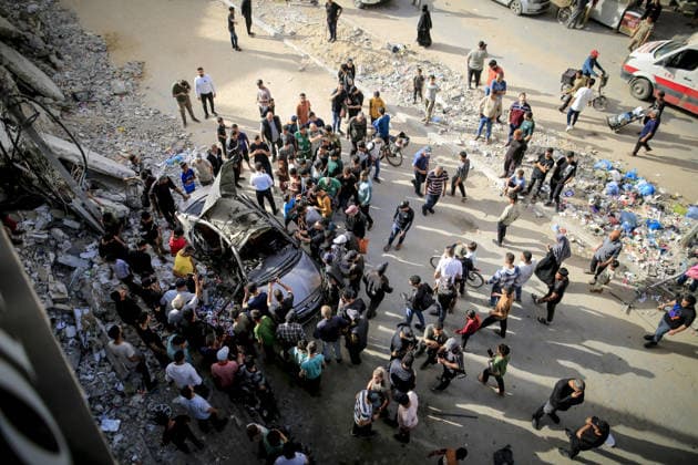 Israeli army targets vehicle in Gaza Strip GAZA CITY, GAZA, PALESTINE - MAY 19: Palestinians inspect a damaged vehicle after an Israeli army strike in the al-Rimal neighborhood of Gaza City, Gaza Strip, Palestine on May 19, 2026. According to reports, one person was killed and four others were injured in the attack targeting the vehicle. Saeed M. M. T. Jaras Anadolu Gaza Palestine. Editorial use only. Please get in touch for any other usage.  Copyright: x2026xAnadoluxSaeedxM.xM.xT.xJarasx