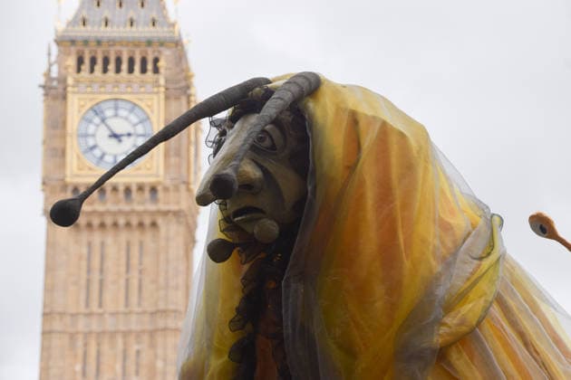 May 19, 2026, London, England, United Kingdom: An activist wears a large slug costume in Parliament Square during the march for ancient woodland restoration. Organised by the campaign group Wild Card, the protesters marched to the Department for Environment, Food and Rural Affairs (DEFRA) calling on the government to restore so-called ghost woods , remains of ancient ecosystems buried beneath timber plantations. London United Kingdom - ZUMAv130 20260519_zip_v130_046 Copyright: xVukxValcicx