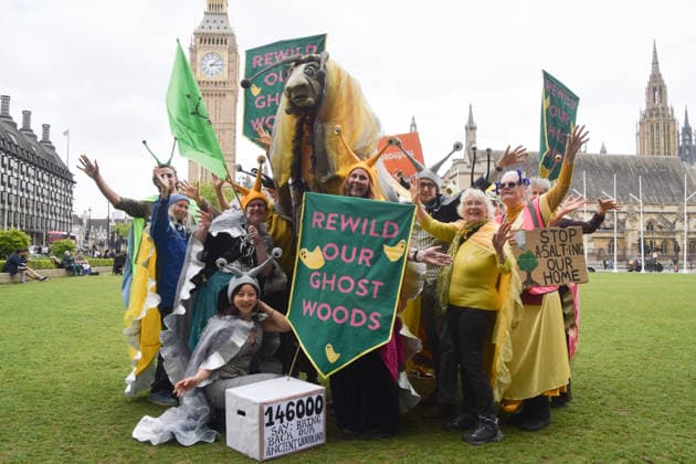 May 19, 2026, London, England, United Kingdom: Activists wearing slug costumes gather in Parliament Square during the march for ancient woodland restoration. Organised by the campaign group Wild Card, the protesters marched to the Department for Environment, Food and Rural Affairs (DEFRA) calling on the government to restore so-called ghost woods , remains of ancient ecosystems buried beneath timber plantations.Parliament Square during the march for ancient woodland restoration. Organised by the campaign group Wild Card, the protesters marched to the Department for Environment, Food and Rural Affairs (DEFRA) calling on the government to restore so-called ghost woods , remains of ancient ecosystems buried beneath timber plantations. Londo - ZUMAv130 20260519_zip_v130_053 Copyright: xVukxValcicx