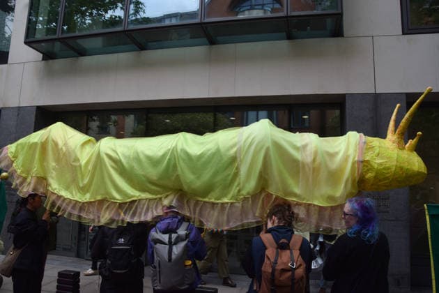 May 19, 2026, London, England, United Kingdom: Activists hold a large model slug outside DEFRA during the march for ancient woodland restoration. Organised by the campaign group Wild Card, the protesters marched to the Department for Environment, Food and Rural Affairs (DEFRA) calling on the government to restore so-called ghost woods , remains of ancient ecosystems buried beneath timber plantations. London United Kingdom - ZUMAv130 20260519_zip_v130_075 Copyright: xVukxValcicx