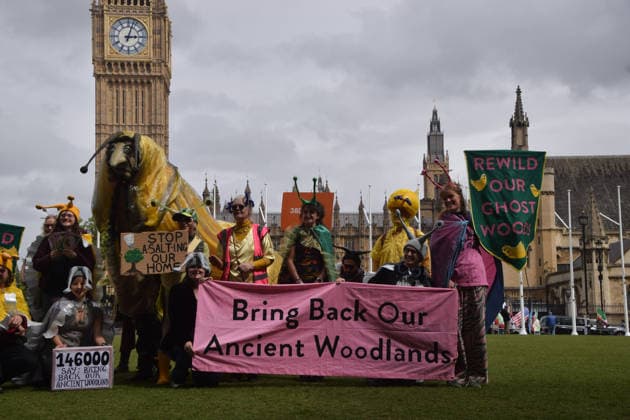 May 19, 2026, London, England, United Kingdom: Activists wearing slug costumes gather in Parliament Square during the march for ancient woodland restoration. Organised by the campaign group Wild Card, the protesters marched to the Department for Environment, Food and Rural Affairs (DEFRA) calling on the government to restore so-called ghost woods , remains of ancient ecosystems buried beneath timber plantations. London United Kingdom - ZUMAv130 20260519_zip_v130_066 Copyright: xVukxValcicx
