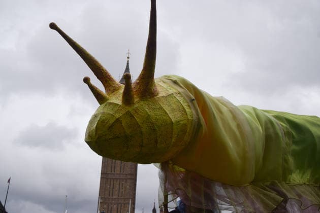 May 19, 2026, London, England, United Kingdom: Activists hold a large model slug in Parliament Square during the march for ancient woodland restoration. Organised by the campaign group Wild Card, the protesters marched to the Department for Environment, Food and Rural Affairs (DEFRA) calling on the government to restore so-called ghost woods , remains of ancient ecosystems buried beneath timber plantations. London United Kingdom  - ZUMAv130 20260519_zip_v130_093 Copyright: xVukxValcicx