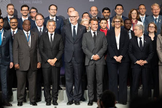 Emmanuel Macron attends the No Money for Terror conference - Paris French President Emmanuel Macron, French Justice Minister Gerald Darmanin, French Economy, Finances and Industry Minister Roland Lescure and G7 Finance ministers and delegations representatives pose for a group photo during a conference entitled No Money for Terror on the sidelines of the G7 finance ministers meeting aimed at cutting off financing of terrorism through organised crime, in Paris on May 19, 2026. Photo by Raphael Lafargue ABACAPRESS.COM Paris France  Copyright: xLafarguexRaphael ABACAx