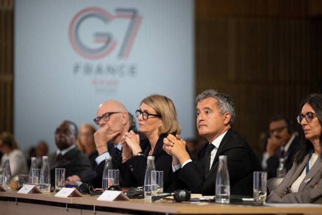 Emmanuel Macron attends the No Money for Terror conference - Paris French Minister of Justice Gerald Darmanin during the 5th No Money for Terror conference on the sidelines of the G7 finance ministers meeting aimed at cutting off financing of terrorism through organised crime, in Paris on May 19, 2026. Photo by Raphael Lafargue ABACAPRESS.COM Paris France  Copyright: xLafarguexRaphael ABACAx