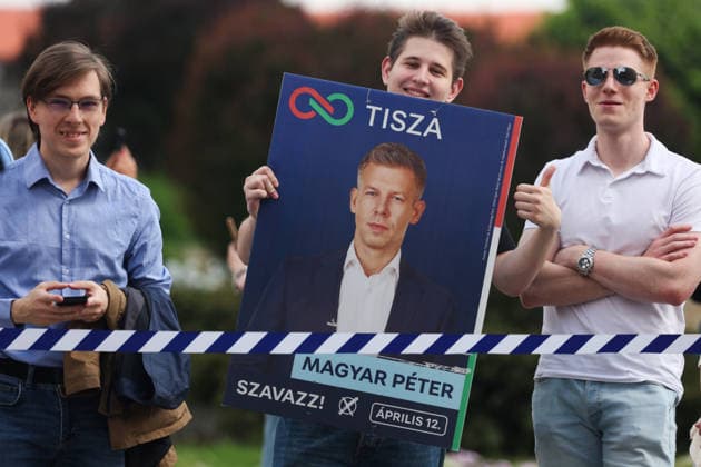 May 19, 2026, Krakow, Poland: A person holds an election poster of Peter Magyar during Hungarian Prime Minister s visit in Krakow, Poland on May 19th, 2026. Magyar has arrived in Poland for his very first state visit since taking office, embarking on a strategic, high-profile three-city tour of Krakow, Warsaw, and Gdansk to signal a major European diplomatic reset. Krakow Poland - ZUMAj333 20260519_zip_j333_006 Copyright: xKaixJanex
