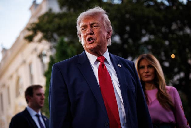 U.S. President Donald Trump turns to photographersin the press pool after greeting guests during the Congressional Picnic on the South Lawn of the White House on May 19, 2026 in Washington, DC.  WAX20260519802 SamuelxCorum