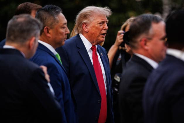 U.S. President Donald Trump greets guests during the Congressional Picnic on the South Lawn of the White House on May 19, 2026 in Washington, DC.  WAX20260519832 SamuelxCorum