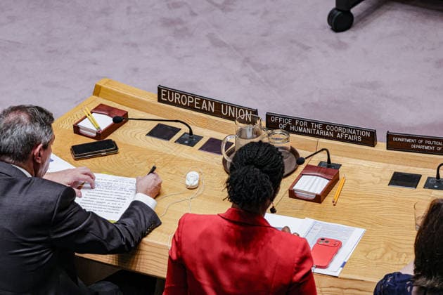 May 19, 2026, New York, New York, USA: A view from behind STAVROS LAMBRINIDIS, Ambassador and Head of the European Union Delegation to the United Nations, as he makes notes on his speech before speaking in a UN Security Council meeting on Ukraine at UNHQ. EDEM WOSORNU, Director of the Crisis Response Division at OCHA, is seated in red next to him. New York USA - ZUMAo116 20260519_znp_o116_030 Copyright: xBiancaxOterox