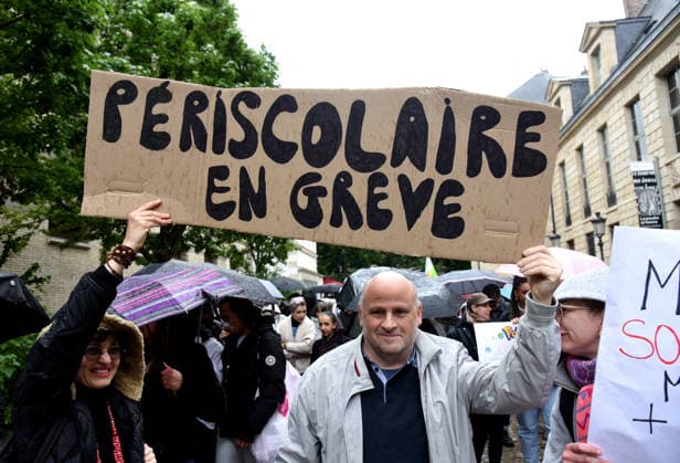 RECORD DATE NOT STATED Periscolaire Strike Against Sexual Violence - Paris Demonstrators take part in a strike of periscolaire workers in Paris, France on May 19, 2026, as an investigation into sexual violence in the Parisian periscolaire system targets 84 kindergartens, around twenty schools and around ten creches. Photo by Alain Apaydin ABACAPRESS.COM Paris France  Copyright: xApaydinxAlain ABACAx