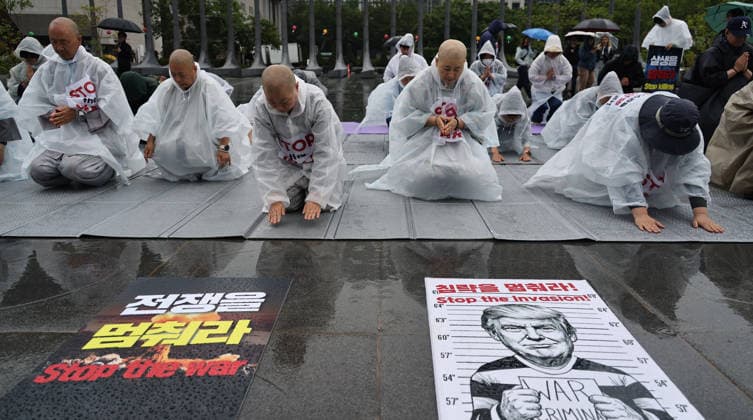 Buddhist monks, activists call for peace in the Middle East Monks of the Jogye Order and peace activists perform 108 prostrations in front of the US Embassy in Seoul, South Korea, on May 20, 2026. The demonstrators utilized the traditional Buddhist ritual to pray for an immediate end to the conflict in the Middle East and to advocate for global peace. Seoul South Korea  Copyright: xMatrixxImagesx xLeexSang-hoonx