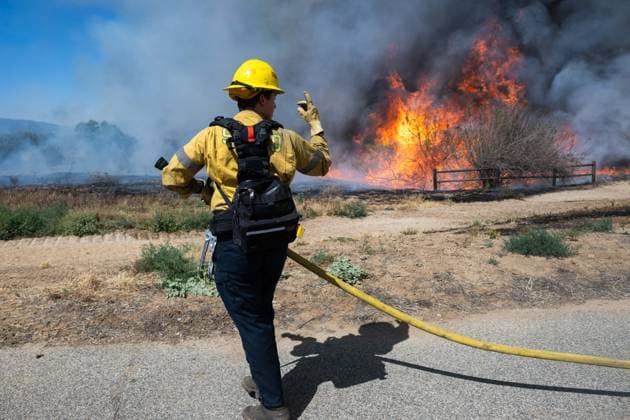 Bain Fire erupts in Jurupa Valley burns over 600 acres CALIFORNIA, US - MAY 19: San Bernadino County Firefighters seen during the Bain Fire originating from Jurupa Valley, California, United States on May 19, 2026. Jon Putman Anadolu California United States. Editorial use only. Please get in touch for any other usage.  Copyright: x2026xAnadoluxJonxPutmanx