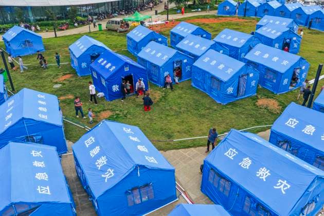 LIUZHOU, CHINA - MAY 19: Tents are set up for quake-affected residents at a resettlement site after a 5.2-magnitude earthquake on May 19, 2026 in Liunan District, Liuzhou City, Guangxi Zhuang Autonomous Region of China. Another 5.2-magnitude earthquake jolted Liunan district, Liuzhou city in South China s Guangxi Zhuang Autonomous Region at 9:44 pm on May 18. This was the second 5.2 magnitude earthquake to hit Liuzhou within one day. Emergency, fire, and police authorities rushed to the scene immediately after the quake to carry out rescue operations.  Copyright: xVCGx 111642759969