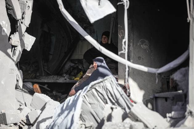 Israeli army targets building in the Bureij camp in Gaza BUREIJ, GAZA, PALESTINE - MAY 20: Palestinians inspect the destruction of a residential building belonging to the Abu Shamala family following an Israeli air strike at the Bureij camp in the central Gaza Strip, Palestine on May 20, 2026. The targeted attack completely flattened the multi-story structure and caused extensive structural damage to numerous neighboring homes. Moiz Salhi Anadolu Bureij Gaza. Editorial use only. Please get in touch for any other usage.  Copyright: x2026xAnadoluxMoizxSalhix