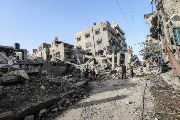 Israeli army targets building in the Bureij camp in Gaza BUREIJ, GAZA, PALESTINE - MAY 20: Palestinians inspect the destruction of a residential building belonging to the Abu Shamala family following an Israeli air strike at the Bureij camp in the central Gaza Strip, Palestine on May 20, 2026. The targeted attack completely flattened the multi-story structure and caused extensive structural damage to numerous neighboring homes. Moiz Salhi Anadolu Bureij Gaza. Editorial use only. Please get in touch for any other usage.  Copyright: x2026xAnadoluxMoizxSalhix