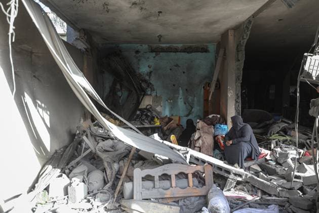Israeli army targets building in the Bureij camp in Gaza BUREIJ, GAZA, PALESTINE - MAY 20: Palestinians inspect the destruction of a residential building belonging to the Abu Shamala family following an Israeli air strike at the Bureij camp in the central Gaza Strip, Palestine on May 20, 2026. The targeted attack completely flattened the multi-story structure and caused extensive structural damage to numerous neighboring homes. Moiz Salhi Anadolu Bureij Gaza. Editorial use only. Please get in touch for any other usage.  Copyright: x2026xAnadoluxMoizxSalhix