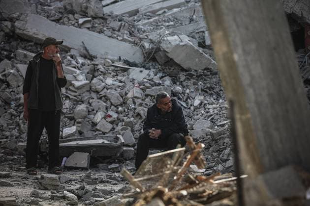 Israeli army targets building in the Bureij camp in Gaza BUREIJ, GAZA, PALESTINE - MAY 20: Palestinians inspect the destruction of a residential building belonging to the Abu Shamala family following an Israeli air strike at the Bureij camp in the central Gaza Strip, Palestine on May 20, 2026. The targeted attack completely flattened the multi-story structure and caused extensive structural damage to numerous neighboring homes. Moiz Salhi Anadolu Bureij Gaza. Editorial use only. Please get in touch for any other usage.  Copyright: x2026xAnadoluxMoizxSalhix