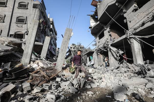 Israeli army targets building in the Bureij camp in Gaza BUREIJ, GAZA, PALESTINE - MAY 20: Palestinians inspect the destruction of a residential building belonging to the Abu Shamala family following an Israeli air strike at the Bureij camp in the central Gaza Strip, Palestine on May 20, 2026. The targeted attack completely flattened the multi-story structure and caused extensive structural damage to numerous neighboring homes. Moiz Salhi Anadolu Bureij Gaza. Editorial use only. Please get in touch for any other usage.  Copyright: x2026xAnadoluxMoizxSalhix