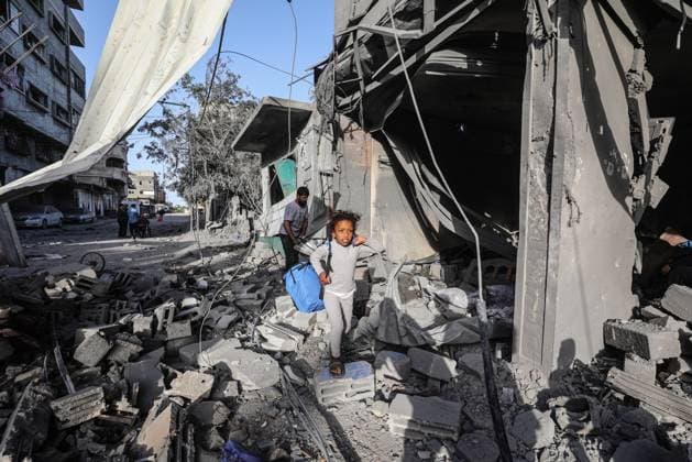 Israeli army targets building in the Bureij camp in Gaza BUREIJ, GAZA, PALESTINE - MAY 20: Palestinians inspect the destruction of a residential building belonging to the Abu Shamala family following an Israeli air strike at the Bureij camp in the central Gaza Strip, Palestine on May 20, 2026. The targeted attack completely flattened the multi-story structure and caused extensive structural damage to numerous neighboring homes. Moiz Salhi Anadolu Bureij Gaza. Editorial use only. Please get in touch for any other usage.  Copyright: x2026xAnadoluxMoizxSalhix