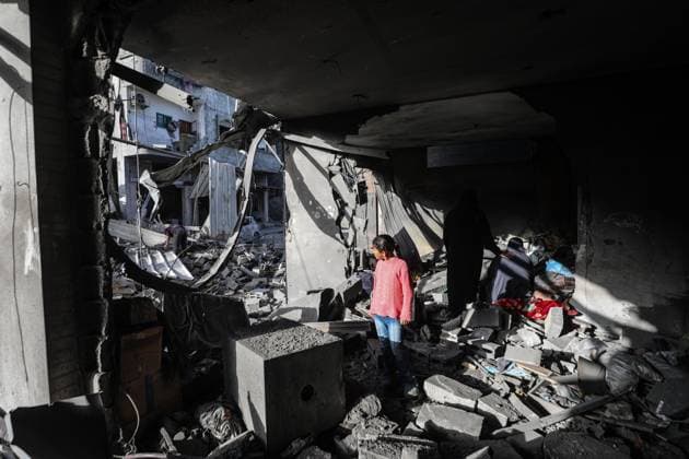 Israeli army targets building in the Bureij camp in Gaza BUREIJ, GAZA, PALESTINE - MAY 20: Palestinians inspect the destruction of a residential building belonging to the Abu Shamala family following an Israeli air strike at the Bureij camp in the central Gaza Strip, Palestine on May 20, 2026. The targeted attack completely flattened the multi-story structure and caused extensive structural damage to numerous neighboring homes. Moiz Salhi Anadolu Bureij Gaza. Editorial use only. Please get in touch for any other usage.  Copyright: x2026xAnadoluxMoizxSalhix