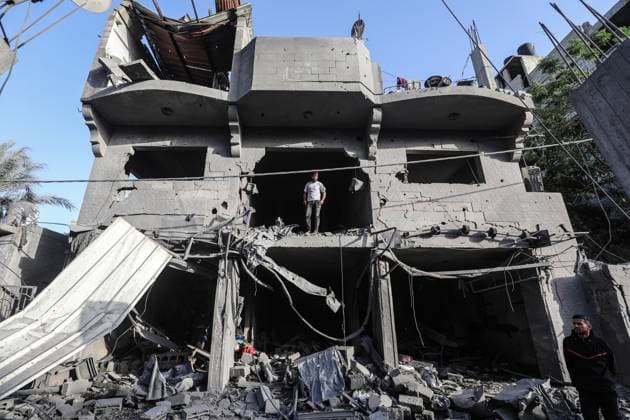 Israeli army targets building in the Bureij camp in Gaza BUREIJ, GAZA, PALESTINE - MAY 20: Palestinians inspect the destruction of a residential building belonging to the Abu Shamala family following an Israeli air strike at the Bureij camp in the central Gaza Strip, Palestine on May 20, 2026. The targeted attack completely flattened the multi-story structure and caused extensive structural damage to numerous neighboring homes. Moiz Salhi Anadolu Bureij Gaza. Editorial use only. Please get in touch for any other usage.  Copyright: x2026xAnadoluxMoizxSalhix