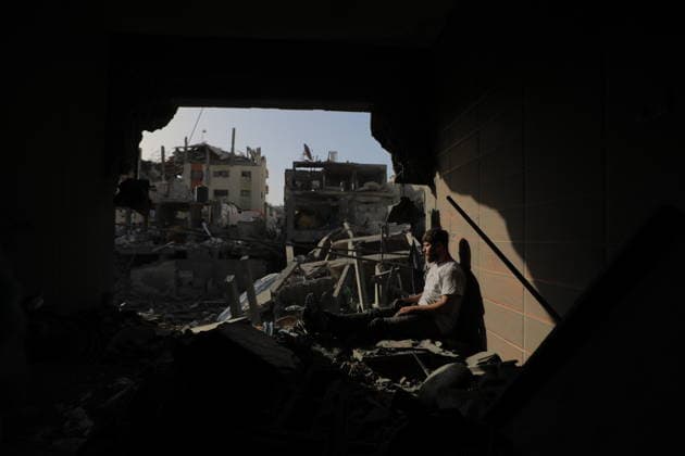 Palestinians Inspect Destroyed Homes After Israeli Strike in al-Bureij Palestinians inspect their destroyed homes following an overnight Israeli airstrike in al-Bureij refugee camp in the central Gaza Strip, on May 20, 2026. Israeli warplanes carried out a strike overnight targeting a house belonging to the Abu Shamala family after residents were warned to evacuate the building. Photo by Hassan al-Jedi apaimages Nusairat Gaza Strip Palestinian Territory 200526_Bureij_HJ_00(36).jpeg Copyright: xapaimagesxHassanxal-Jedixx xapaimagesx