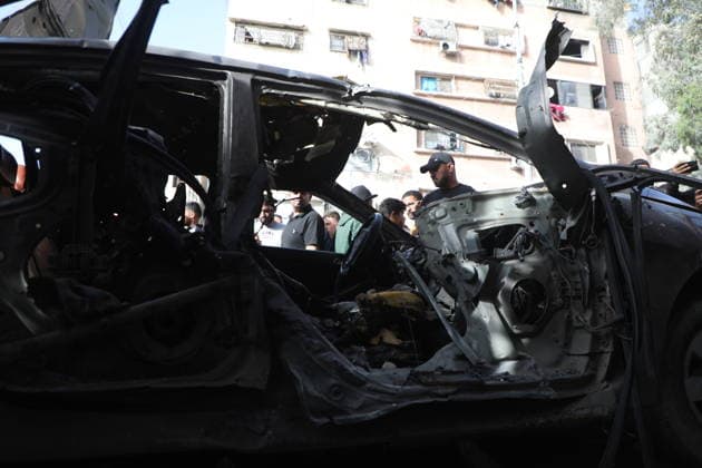 Palestinians Gather at Site of Israeli Strike in Gaza City others. May 20, 2026: Palestinians Gather at Site of Israeli Strike in Gaza City Palestinians gather at the site of an Israeli airstrike that targeted a vehicle on al-Shuhada Street in Gaza City, on May 19, 2026. According to local sources, the strike killed one person and wounded several others. Copyright: xx