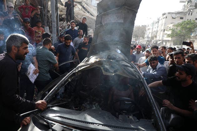 Palestinians Gather at Site of Israeli Strike in Gaza City others. May 20, 2026: Palestinians Gather at Site of Israeli Strike in Gaza City Palestinians gather at the site of an Israeli airstrike that targeted a vehicle on al-Shuhada Street in Gaza City, on May 19, 2026. According to local sources, the strike killed one person and wounded several others. Copyright: xx