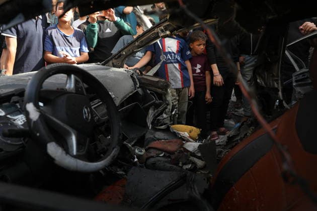 Palestinians Gather at Site of Israeli Strike in Gaza City others. May 20, 2026: Palestinians Gather at Site of Israeli Strike in Gaza City Palestinians gather at the site of an Israeli airstrike that targeted a vehicle on al-Shuhada Street in Gaza City, on May 19, 2026. According to local sources, the strike killed one person and wounded several others. Copyright: xx
