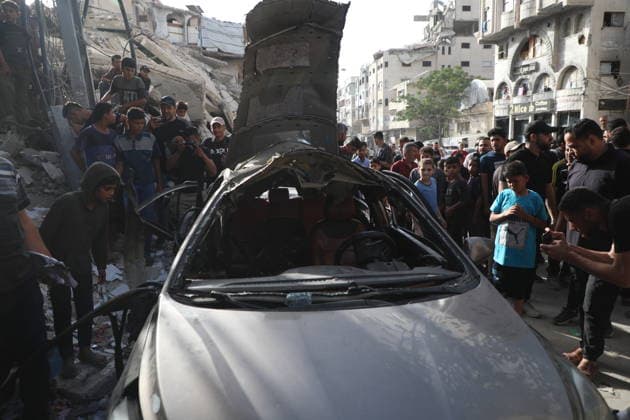 Palestinians Gather at Site of Israeli Strike in Gaza City others. May 20, 2026: Palestinians Gather at Site of Israeli Strike in Gaza City Palestinians gather at the site of an Israeli airstrike that targeted a vehicle on al-Shuhada Street in Gaza City, on May 19, 2026. According to local sources, the strike killed one person and wounded several others. Copyright: xx